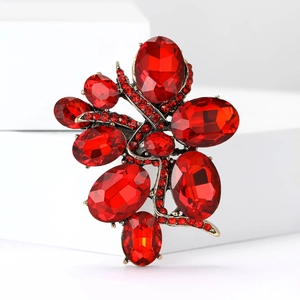 Elegant gold alloy brooch with red oval gemstones and sparkling rhinestones flower design