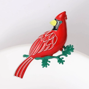 Elegant red cardinal bird enamel brooch pin with green crystal eye on a branch