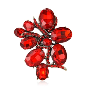 Elegant vintage style alloy brooch with multifaceted red rhinestones on a white background