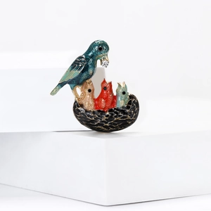 Fashionable enamel bird family brooch with colored glazing and sparkling zircon details