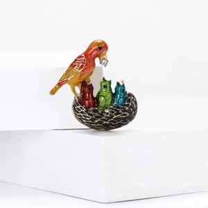 Charming enamel bird family brooch with colorful birds and rhinestone on white blocks