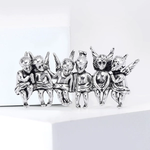 Retro antique silver angel brooch with six cupids and embossed wing details