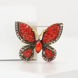 Exquisite red butterfly brooch with rhinestones and bronze alloy frame for women