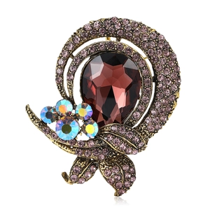 Vintage alloy glass brooch with purple pear-shaped gemstone and crystal rhinestones