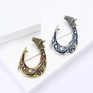 Vintage alloy fish hook brooches in gold and silver with colorful enamel drip detail