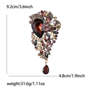 Detail view of crystal flower brooch with size 9.2x4.8cm and weight 31.6g specs