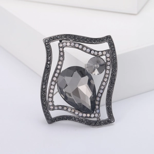 Elegant black rhinestone brooch with double wave frame and grey teardrop crystal