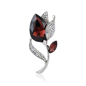 Elegant tulip flower brooch with ruby crystal and shimmering small diamonds on silver alloy