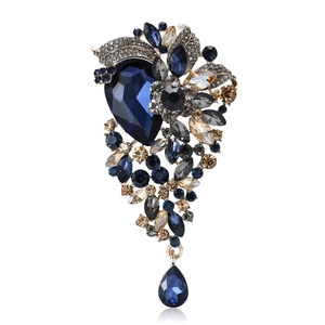 Elegant deep blue crystal drop brooch with sparkling zircon rhinestones on white background