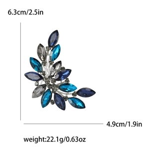 Elegant vintage flower cluster crystal brooch with blue and smoke grey marquise rhinestones