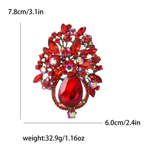 Broche fleur vintage avec strass rouges et dimensions détaillées de 7,8 cm de hauteur