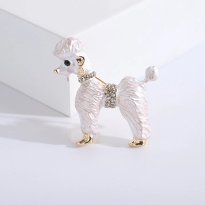 Cute Poodle dog brooch in gold alloy with white enamel and sparkling rhinestones