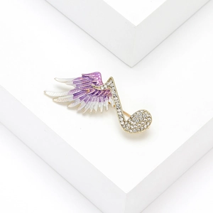 Spilla creativa a nota musicale con ali viola sfumate e strass brillanti da donna