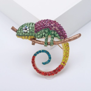 Creative colorful enamel chameleon brooch with vibrant rhinestones on bronze branch