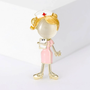 Detail view of Japanese style nurse brooch featuring white opal and pink enamel accents