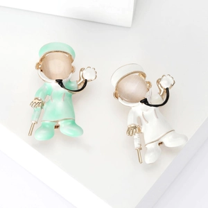 Cute Cartoon Doctor Brooch Enamel Pin With Cat Eye Stone Stethoscope Syringe Design Alloy Badge For Nurse Medical Workers