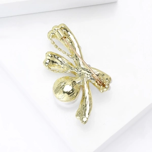 Elegant gold insect brooch with pearl and secure safety pin fastener for women
