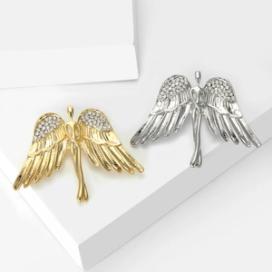 Elegant angel wing brooches with sparkling crystals in gold and silver finishes