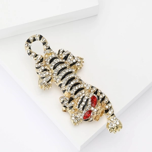 Broche tigre vintage avec cadre en alliage doré, strass étincelants et rayures en émail noir