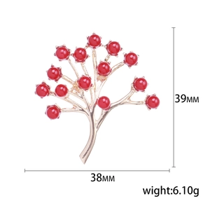 Broche élégante en branche de feuilles dorées avec perles rouges pour manteaux