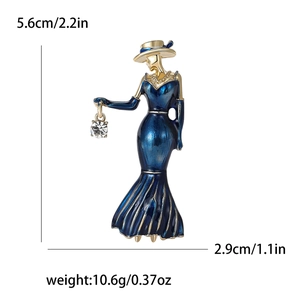 Detail view of a vintage lady brooch with blue enamel dress and size specifications