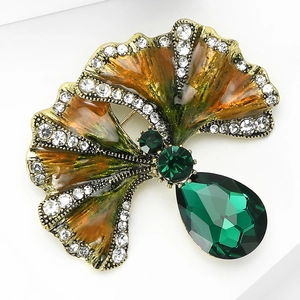 Detail of ginkgo leaf brooch with green enamel, rhinestones and teardrop crystal