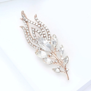 Elegant rose gold peacock feather brooch with sparkling rhinestones and marquise crystals
