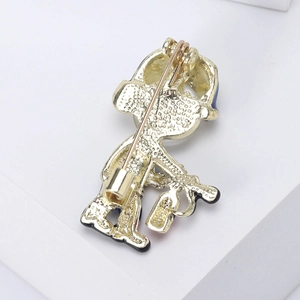 Back view of cute firefighter hero enamel brooch with gold finish and pin fastener