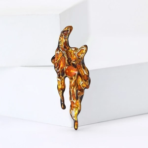 Creative lava style enamel brooch with amber translucent flow effect and gold trim