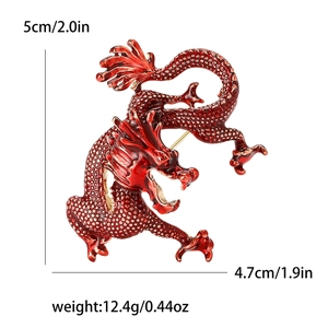 Detailed view of red enamel dragon brooch showing size dimensions 5cm height and 4.7cm width