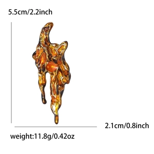 Artistic gold enamel lava brooch with fluid amber organic shape and glossy finish