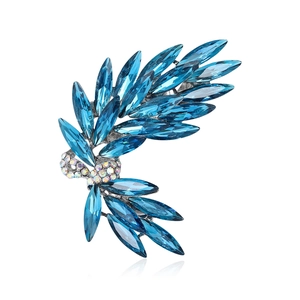 Elegant silver-toned wheat ear brooch with marquise-cut deep blue crystals and rhinestones