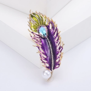 Vintage peacock feather brooch with colorful zircon, enamel inlay, and white pearl drop