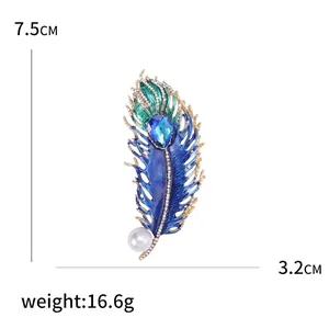 Peacock feather brooch with blue zircon, white pearl, and enamel inlay for coats