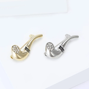 Minimalist pipe-shaped brooches in gold and silver plating with clear rhinestones