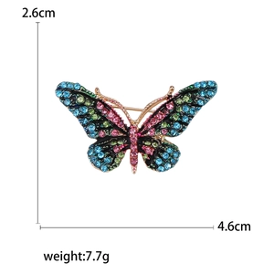 Elegant butterfly brooch with colorful rhinestones in 4.6cm width and 2.6cm height