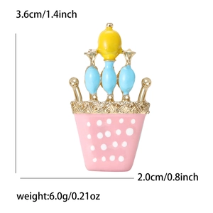 Vue détaillée de la broche en émail coloré avec dimensions 3,6x2,0cm et poids 6,0g
