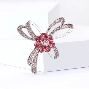 Broche nœud élégante en argent avec cristaux roses et strass pour mode féminine