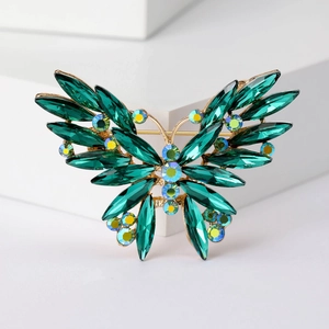 Elegant gold butterfly brooch with emerald marquise crystals and colorful rhinestones