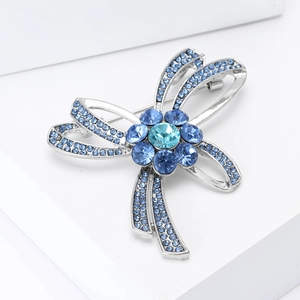 Broche nœud élégante en argent avec strass bleus et cristaux floraux pour vêtements