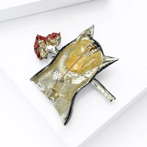 Detailed back view of a husky brooch featuring a secure golden pin on silver metal
