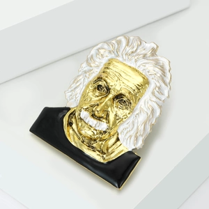Vintage Albert Einstein enamel brooch with gold-plated finish and white artistic details