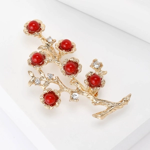Vintage golden branch brooch with red pearls and crystals for elegant suits and blazers