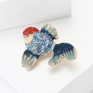 Exquisite goldfish brooch with red and blue rhinestones on a gold alloy setting