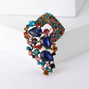 Bohemian safety pin brooch with colorful rhinestones and blue teardrop crystal
