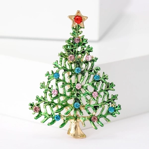 Detailed close-up of hollow Christmas tree brooch with colorful rhinestones and enamel