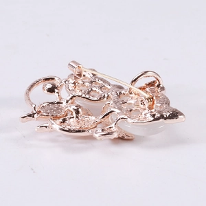 Broche et pendentif exquis en or rose avec pierre œil de chat et motifs ajourés fins