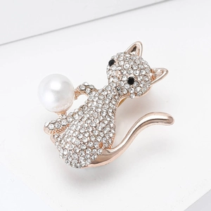 Elegant rose gold cat brooch with sparkling rhinestones and a large white pearl accent