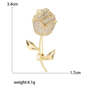 Elegant gold rose brooch with white crystals measuring 3.4cm by 1.7cm for women