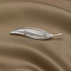 Detail of the safety pin clasp and cubic zirconia inlay on the silver leaf brooch